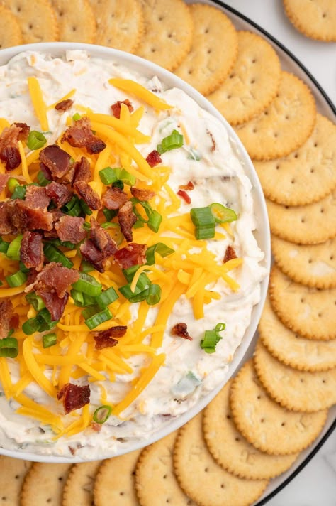 crack dip served on a plate with crackers. Cold Dip Recipes For Crackers, Cracked Corn Dip Recipe, Crackers And Dip Platter, Cold Cracker Dip Recipe, Cold Dips For Crackers, Dips That Go Good With Crackers, Appetizers With Crackers, Ritz Cracker Dip Recipes, Cracker Spreads Easy