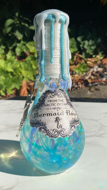 Mermaid Potion Bottle, Fairy Potion Bottles, Fantasy Poison, Dnd Supplies, Mermaid Potion, Arctic Mermaid, Forest Apothecary, Potion Maker, Alcohol Bottle Decorations