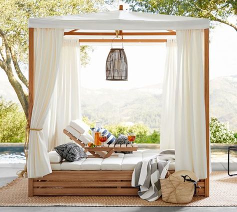 12 Patio Daybeds That Will Totally Make Your Summer | Give your yard the feel of an upscale cabana with this teak patio daybed—the pair of lounges are adjustable so you can recline as you wish, and the canopy helps keep you in the shade. #realsimple #outdoordecor #outdoorentertaining Daybed Canopy, Daybed Cushion, Double Chaise Lounge, Patio Daybed, Pool Cabana, Outdoor Daybed, Double Chaise, Outdoor Furniture Cushions, Canopy Bed