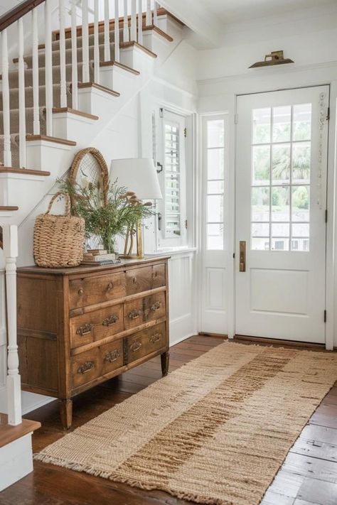 Charming Farmhouse Foyer Ideas to Welcome You Home Modern Farm Entryway, Small Enclosed Entryway, Farmhouse Modern Entryway Ideas, English Cottage Foyer, Vintage Foyer Ideas, Colonial Entryway Foyers, Entryway With Stairs Ideas, English Style Home Interior Design, Staircase Entryway Ideas