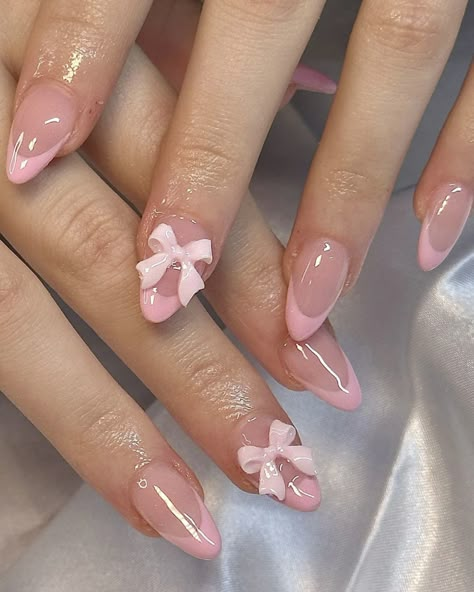 Pink Bow Nails Aesthetic, Soft Pink Valentine Nails, Acrylic Bows On Nails, Valentines Nails Coquette, Pink Coquette Nails Short, Pink Bow Acrylic Nails, Pink Coquette Nails Almond, Almond French Tip Nails With Bow, Bow Valentines Nails