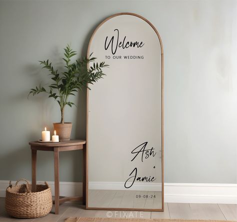 Wedding mirror stickers add a personal touch to your big day. Custom decals with your names & wedding date make a beautiful addition to any mirror. #wedding #weddingdecor . #Welcome_Wedding_Signs_Mirror #Wedding_Mirror_Decorating_Ideas #Hello_Gorgeous_Mirror_Wedding #Wedding_Reception_Welcome_Sign_Mirror Round Wedding Mirror Sign, Black Wedding Mirror Sign, Arched Mirror Wedding Sign, Wedding Entry Sign Entrance, Mirrored Wedding Signs, Diy Selfie Mirror Wedding, Mirror Sign For Wedding, Mirror Ideas For Wedding, Wedding Reception Mirror Sign