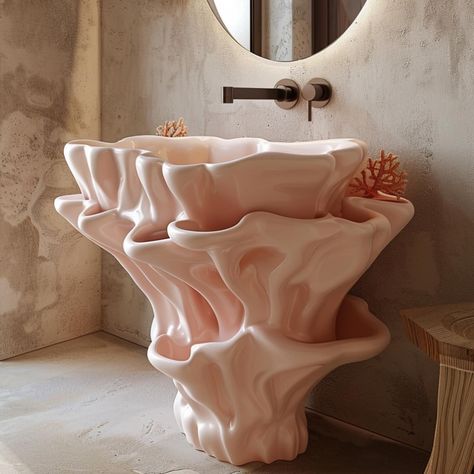 Coral shaped bathroom basins are exquisite fixtures that bring a touch of nature’s beauty into bathroom design. Inspired by the delicate and intricate structures of coral reefs, these basins often feature flowing, organic lines and textures that evoke the underwater world. Crafted from materials like ceramic, glass, or stone, coral shaped bathroom basins not only enhance the aesthetics of the space but also offer practical functionality. They can be found in various colors and finishes, from ... Organic Shape Interior Design, Organic Shape Furniture Design, Coral Reef Bathroom, Coral Inspired Architecture, Organic Design Interior, Organic Forms Design, Coral Ceramics, Organic Shapes In Nature, Underwater Bathroom