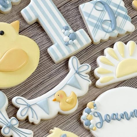 Heavenly K Cookie Co on Instagram: "QUACK QUACK 🐥🛁🧼 💦SPLISH SPLASH 💦   🎀Joanna is One year old 🎀  #birthdaycookies #decoratedsugarcookies #royalicingcookies #edibleart #customcookies #ocmoms #irvinemoms #tustinmoms #socalmoms #heavenlykcookieco #orangecountycookies #occookies #rubberducky #rubberduckcookies #firstbirthdaycookies #bakewithlove" One Silly Goose Cookies, One Lucky Duck Cookies, Rubber Duck Cookies, Rubber Duck Cookies Decorated, Baby Boy Sugar Cookies Royal Icing, First Birthday Rubber Duck Theme, Rubber Ducky Cookies, Duck Cookies, Rubber Ducky Party