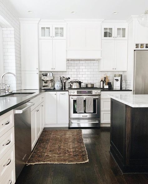 white kitchen dark floors with black countertops and dark hardwood floors Kitchen Dark Floors, White Kitchen Dark Floors, Dark Kitchen Floors, Kitchen Dark, Hardwood Floors Dark, Kitchen Floors, Traditional Kitchen Design, Black Countertops, Dark Floors