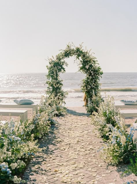 Looking for the perfect beach wedding ceremony?  Look no further than this english garden wedding filled with tropical details! Photography: Kati Rosado (http://www.katirosado.com) Flower Arch Beach Wedding, Wedding Ceremony On The Beach, Wedding Arch On Beach, Beach Flower Wedding, Beach Tropical Wedding, Beach Wedding Arch Ideas, Beach Wedding Florals, Beach Wedding Arches, Flower Beach Wedding