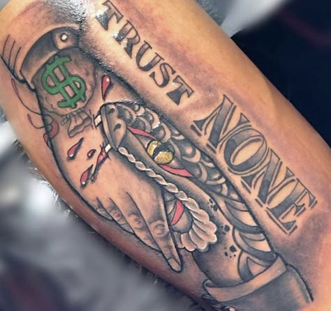 Looking to add some edge to your style? Check out these top money tattoo ideas for men! From intricate designs to bold statements, these tattoos will transform your look. Whether you're a fan of cash or coins, these money-inspired tattoos are sure to make a statement. Explore the best money tattoo ideas for men and elevate your style today! Dope Men Tattoos, Trust None Tattoos Men, Trust None Tattoos, Money Tattoo Ideas For Men, Black Men Tattoos Ideas Forearm, Risk Taker Tattoo, Trap Tattoos Men, Haitian Tattoo, Boyfriend Tattoos