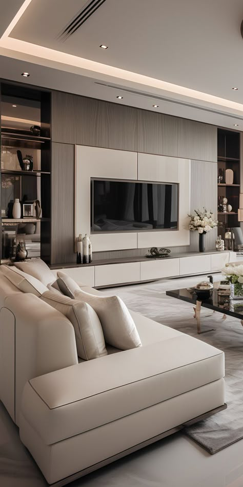 An expansive L-shaped sofa transforms the living space, exuding a contemporary flair. The penthouse's living room elegantly integrates the TV unit, highlighting modern interior design techniques.