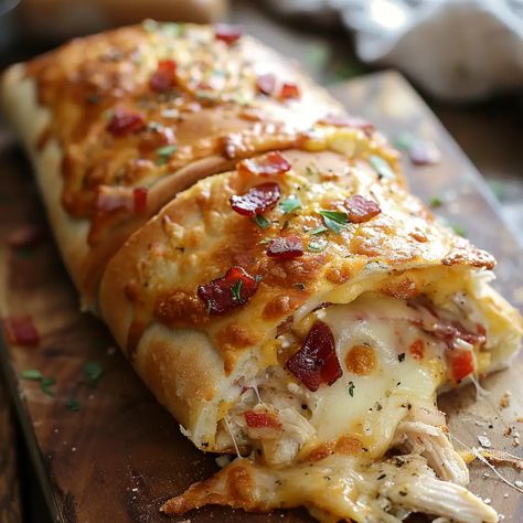 Delicious Chicken Bacon Ranch Stromboli Recipe – Easy & Tasty! Different Stromboli Recipes, Chicken Bacon Stromboli, Family Dinner Meals Healthy, Turkey Stromboli Recipe, Bbq Chicken Stromboli, Chicken Bacon Artichoke Pizza, Easy Family Lunches, Chicken Patty Dinner Ideas, Breakfast Stromboli Recipe