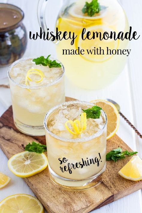 Whiskey lemonade made with homemade lemonade from freshly squeezed lemons, sweetened with honey rather than sugar, and mixed with a shot of whiskey.  It's an easy cocktail to make, refreshing and made in a pitcher so its easy to serve this cocktail to a crowd.  #cookswithcocktails #whiskeycocktail #lemonadecocktail #homemadelemonade #lemoncocktail Go To Cocktails, Whiskey And Lemonade, Refreshing Whiskey Cocktails, Whiskey Lemonade Pitcher, Pitcher Whiskey Cocktails, Bourbon Lemonade Pitcher, Lemon Whiskey Cocktail, Cocktail With Lemonade, Whiskey Cocktails For A Crowd