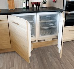 An integrated under counter fridge and freezer set Small Fridge Freezer, Build Kitchen Island, Counter Fridge, Small Fridge, Compact Fridge, Diy Kitchen Countertops, Fridge And Freezer, Under Counter Fridge, Integrated Fridge Freezer