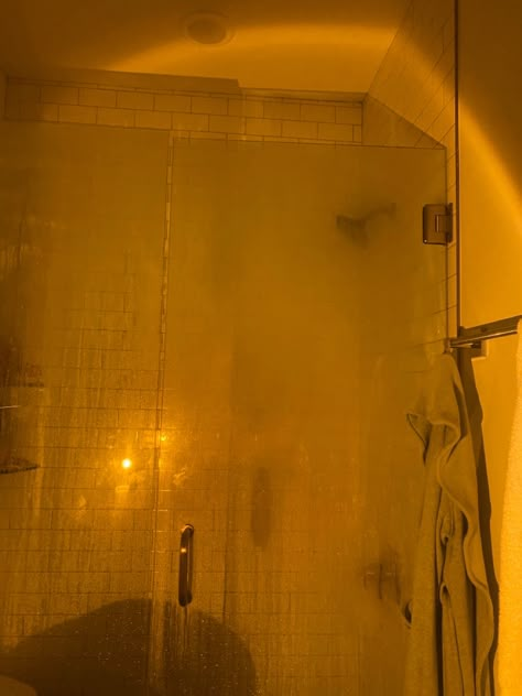 Candle Shower Aesthetic, Sunset Lamp Bathroom, Steamy Shower Door Aesthetic, Fall Shower Aesthetic, Hot Water Shower Aesthetic, Shower At Night Aesthetic, Shower Lamp Bathroom, Evening Shower Aesthetic, Sun Showers Aesthetic