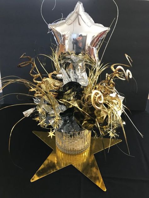 60+ Dazzling DIY Dollar Store New Years Eve Party Ideas - HubPages New Year Home Decor Ideas, Dollar Tree Candlesticks, Happy New Year Eve, New Years Eve Party Ideas, Black Centerpieces, Black And Gold Balloons, Table Centerpieces Diy, New Year Table, Dollar Store Christmas Crafts