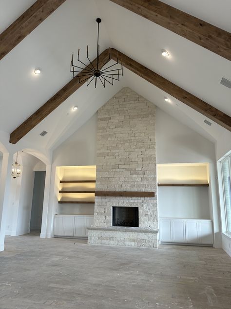 Vaulted Ceiling With Fireplace And Built Ins, Fireplace With Hallways On Both Sides, Built Ins Around Fireplace Cathedral Ceiling, Fireplace All The Way To Ceiling, Fireplace Ceiling To Floor, Fireplace Wall Cathedral Ceiling, Cathedral Ceiling Beams Living Room, Living Room Trusses, Fireplace Cathedral Ceiling Built Ins