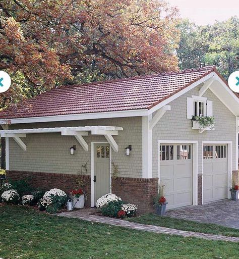 love the pergola and the window box above the window. Something so simple adds so much charm and also affordable. Red Tin Roof House Colors, Garage Trellis, Veranda Design, Farmhouse Garage, Garage Exterior, Pergola Design, Garage Makeover, Red Roof, Casa Exterior