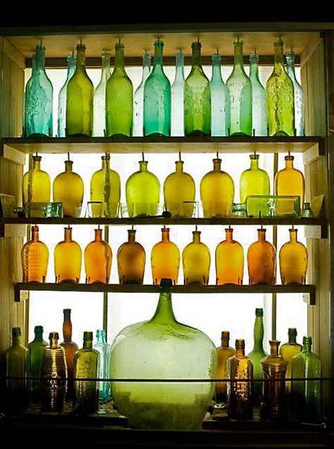 Glass bottles   - Explore the World with Travel Nerd Nici, one Country at a Time. http://TravelNerdNici.com Vintage Bottle Display Ideas, Bottle Collection Display, Bottle Display Ideas, ขวดโหล Mason Jar, Vintage Bottles Decor, Decorative Glass Bottles, Colored Bottles, Colored Glass Bottles, Old Glass Bottles