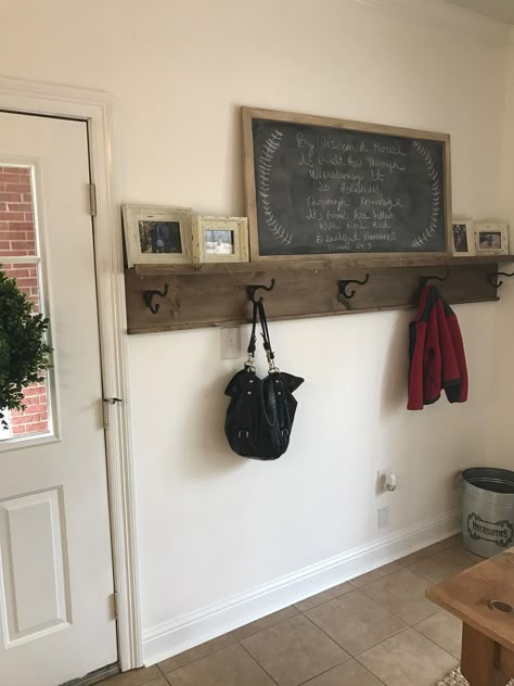 Diy entryway coat rack with picture ledge shelf! We needed something to hang coats, backpacks etc by the back door & this fits the bill perfectly! Stained with Miss Mustard Seed Curio then sealed with dark wax. Chalkboard was a diy(plywood cut down the 1x2 for the frame). Hooks are from Hobby Lobby! Picture Ledge Shelf, Diy Coat Rack, Entryway Coat Rack, Rustic Coat Rack, Hallway Coat Rack, Diy Coat, Diy Entryway, Condo Ideas, Coat Rack Wall