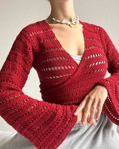 Julia | My red Island wrap top! This one is made with increases on the sleeve the create a bell sleeve effect! #crochetersofinstagram… | Instagram Knitting Wrap Top, Crochet Sweater Flare Sleeves, Crochet Wrap Around Top, Elegant Crochet Top, Crochet Top Bell Sleeve, Crochet Tops Free Patterns Long Sleeve, Red Yarn Crochet Ideas, Crochet Wrap Top Pattern Free, Wrap Top Pattern Free