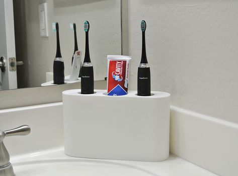 Bathroom Organization Electric Toothbrush, Sonicare Toothbrush Storage, Electronic Toothbrush Storage, Hide Electric Toothbrush On Counter, Electric Toothbrush Holder Ideas, Hiding Toothbrushes Bathroom, Toothpaste Storage Ideas, Hide Electric Toothbrush, Electric Toothbrush Aesthetic