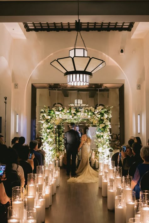 Candlelit Jewish Wedding Ceremony Wedding Aisle Candles Indoor Ceremony, Chuppah White Flowers, Inside Wedding Ceremony, Flower Chuppah, Wedding Chuppah Flowers, Candlelight Wedding Ceremony, Huppah Wedding, Aisle Greenery, Wedding Aisle Candles