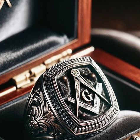 Masonic Buys on Instagram: "Introducing the ✨Masterpiece Collection by 👉Masonicbuys.com:
The Masonic Elegance Ring, a symbol of tradition and distinction. This meticulously crafted ring, embodies the essence of Masonic heritage through its sophisticated design. Central to its allure is the iconic square and compass symbol, exquisitely detailed and possibly accented with fine gemstones, making it not just a ring, but a piece of art.

Encased in a luxurious jewelry box, the ring is presented in a setting that speaks of its prestige. The box, made from the finest dark wood, opens to reveal a plush, velvet-like interior, cradling the ring in a bed of elegance. The lid's interior is lined with soft, satin fabric, further enhancing the sense of luxury that surrounds this exceptional piece.

Thi Mason Ring, Compass Symbol, Masonic Jewelry, Luxurious Jewelry, Masonic Ring, The Masterpiece, Ring Ideas, Sophisticated Design, The Prestige