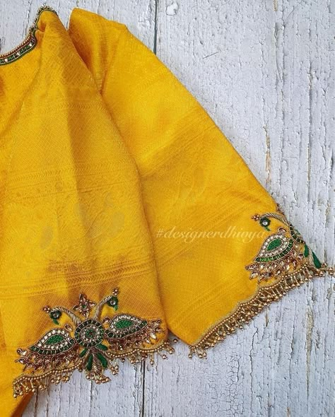 Simple Aari Work Blouse Design Yellow, Simple And Unique Aari Work Blouse Design, Gold Color Maggam Work Blouse, Elegant Aari Work Designs, Kundan Hand Embroidery, Silk Saree Blouse Designs With Work, Sleeve Border Aari Work, Kundan Blouse Work, Kundan Maggam Work Blouses