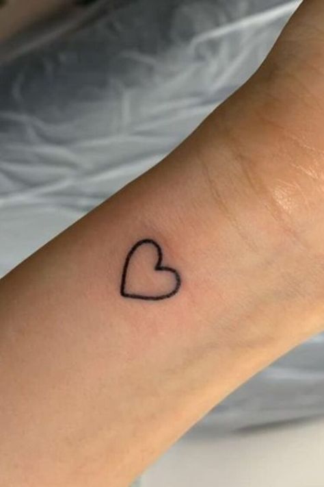 25 Amazing Heart Tattoos For Women To Try In 2023 Small Heart Tattoo On Wrist, Heart On Finger, Amazing Tattoos For Women, Heart Tattoo On Wrist, Heart Tattoos For Women, A Heart Tattoo, Little Heart Tattoos, Love Heart Tattoo, Black Heart Tattoos