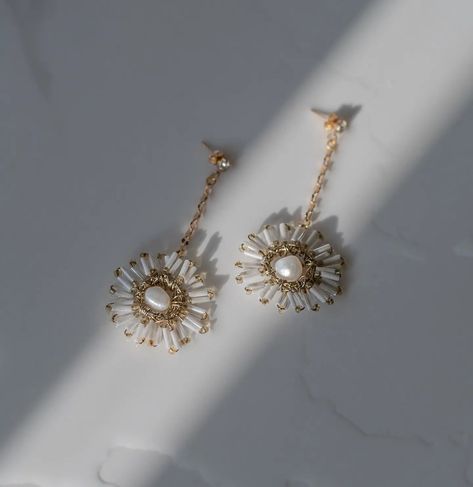 NEW NEW NEW Leo Celestial Star Earrings in Ivory Gold. Available now at www.gibsonbespoke.co.uk Image @elvis_andco #gibsonbespoke #gibsonbespokebridal #bridalearrings #weddingjewellery #luxuryjewellery #baroquepearlearrings #dropbridalearrings #bowearrings #bowjewellery #prettybridalwear #prettybridalthings #londonbridalaccessories Bridal Earrings Drop, Baroque Pearl Earrings, Bow Earrings, New New, Star Earrings, Bridal Earrings, Bridal Wear, Bridal Accessories, Luxury Jewelry