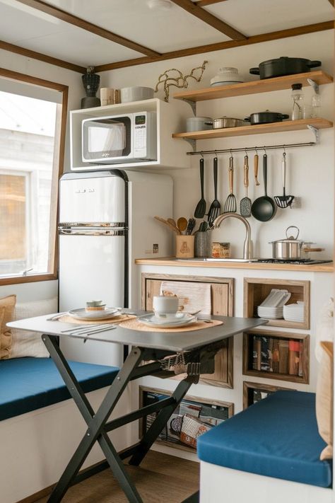 Tiny spaces, big solutions! Discover 10 tiny home kitchen ideas that blend functionality with style. Perfect for small-space living Tiny Kitchen Seating Ideas, Rv Appliances Small Spaces, Micro Kitchen Ideas Small Spaces, Mini Kitchen In Bedroom, Tiny Home Kitchen Layout, Tiny Apartment Ideas Space Saving, Tiny Home Kitchen Ideas, Tiny Apartment Kitchen, Tiny Homes Interior