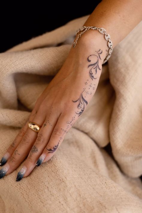 Hand Spiritual Tattoo, Small Feminine Hand Tattoos, Dainty Hand Tats, Body Placement For Tattoos, Light Hand Tattoos, Hand Tattoo Placement Ideas, Woman Hand Tattoo Design, Taurus Constellation Tattoo Hand, Henna Style Tattoo Hand