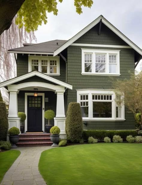 House With Green Exterior, Paint Ideas Exterior House, Siding Colors For Houses With Stone, Hunter Green House Exterior White Trim, Dark Green House Exterior White Windows, Green Paint Colors For Exterior Of House, Ranch Style House Paint Exterior, Green Vinyl Siding House Exterior Colors Black Shutters, Outside Of House Paint Ideas