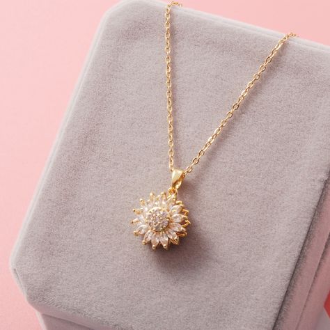 Fashion collier tendances 2022 flower pendant necklace spinning sunflower pendant necklace https://m.alibaba.com/product/1600475471258/Fashion-collier-tendances-2022-flower-pendant.html?__sceneInfo={"cacheTime":"1800000","type":"appDetailShare"} Gold Bridesmaid Bracelet, Delicate Gold Chain, Chunky Silver Rings, Clear Quartz Necklace, Delicate Gold Necklace, Minimalist Pendant, Sparkly Ring, Sunflower Pendant, Sunflower Necklace