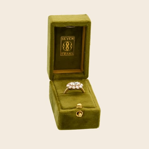 Protect and store your rings with a gorgeous, vintage-inspired velvet ring box in our signature 70's chartreuse green. Modelled on antique ring boxes, this elongated style features a brass clasp closure and is perfect for travel. The ideal bridal accessory, our ring box will ensure you get the perfect ring shot on your big day. *** Included with any purchase over $1000. Art Deco Ring Box, Vintage Ring Boxes Antiques, Green Engagement Ring Vintage, Engagement Ring Boxes Unique, Engagement Ring Box Ideas, Ring Box Aesthetic, Engagement Ring Boxes, Kousa Dogwood, Green Engagement Rings