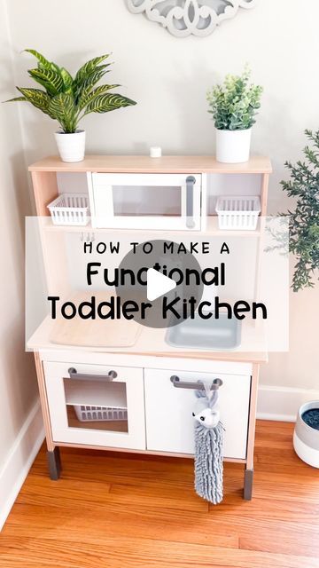 Jamie Robinson on Instagram: "I had wanted to make a functional kitchen for the toddlers a year ago, but just never got around to it. We finally completed it a week of two ago and I can honestly say I wish I’d have done it earlier. I was getting tired of lifting the kids to the kitchen sink to wash their hands. Now they can wash on their own (although we have to monitor the soap because they like A LOT of soap 😂)!  Comment LINK and I’ll send you the links to everything you need! (Also can be found in my bio too)   #functionalkitchen #playkitchen #ikeaplaykitchen #diyplaykitchen #ikeahack #diyplayideas #montessoriathome #montessori #childledlearning #childdevelopment #independent #independentchild #playhousediy #momsofig #dadsofinstagram" How To Build A Toy Kitchen, Play Kitchen Functional Sink, Working Kitchen For Kids, Play Kitchen Montessori, Play Kitchen In The Kitchen, Ikea Functional Play Kitchen, Kids Montessori Kitchen, Montessori Sink Diy, Kids Functional Kitchen