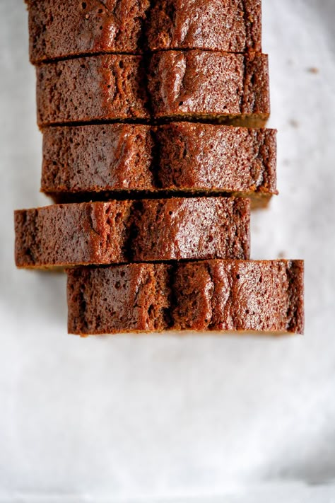 This super easy gingerbread loaf cake is heavily spiced, with a perfect moist texture. It comes together in only a saucepan and a bowl. Gingerbread loaf makes the perfect gift, or is great to have on hand if you need a homemade loaf cake filled with holiday flavours. Light Gingerbread Cake, Ginger Bread Loaf Cake, Loaf Cake Christmas, Ginger Loaf Cake Recipe, Simple Loaf Cake Recipe, Healthy Gingerbread Loaf, Gingerbread Recipe Loaf, Spiced Loaf Cake, Moist Gingerbread Loaf