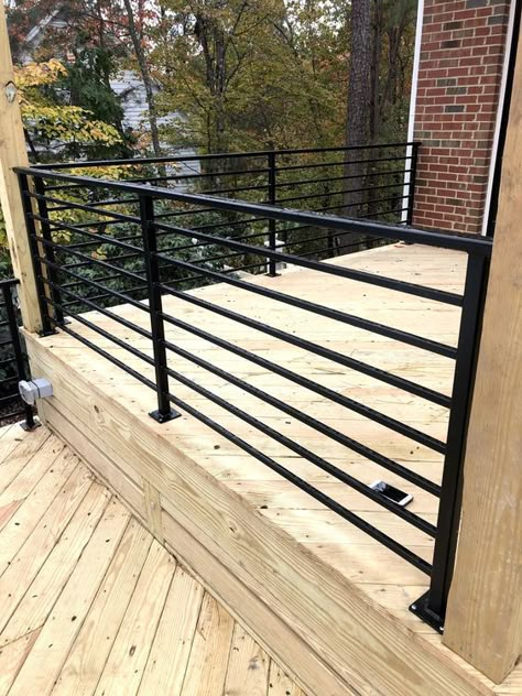 Metal Railings Outdoor Porch Ideas, Exterior Deck Railing Ideas, Black Rod Iron Deck Railing, Railing For Concrete Porch, Garden Railings Metal, Modern Iron Railings Outdoor, Black Metal Railings Outdoor, Railing Around Concrete Patio, Outdoor Metal Railing