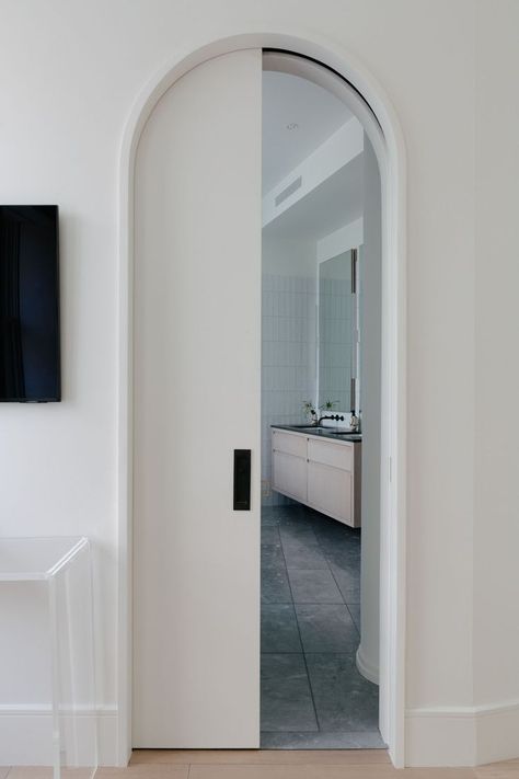 Arched Pocket Door, Manhattan Loft Apartment, Brownstone Boys, Modern Door Design, Doors Decoration, Pocket Doors Bathroom, Bathroom Door Ideas, Arched Interior Doors, Decorative Doors