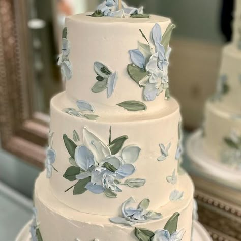 Charleston Wedding Guide on Instagram: "There is no shortage of #MondayMotivation when it comes to wedding cakes in Charleston! ✨ Follow the link in our bio for everything you need to plan your Lowcountry wedding. 📷@tenacioustart" Two Layer Wedding Cakes With Flowers, Wedding Cake Ideas Spring, Buttercream Floral Wedding Cake, Vintage Floral Wedding Cake, Dusty Blue And Sage Green Wedding Cake, Wedding Cake Blue Flowers, Wedding Cake Ocean, Blue Flower Wedding Cake, Blue Hydrangea Cake