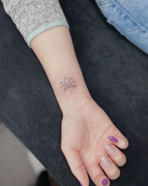 33 Lotus Flower Tattoo Ideas😊#tattoo #tattooideas #tatouagecuissefemme #tattoominimalist #backtattoo #tattoosforwomen #tattoomain #minitats Lotus North Star Tattoo, Lotus Flower Heart Tattoo, Lotus Flower Tattoo Wrist For Women, Lotus Rebirth Tattoo, Micro Lotus Tattoo, Lotus Flower I Am Enough Tattoo, Symbolic Flower Tattoos, Tattoos For Rebirth, Pretty Lotus Flower Tattoo