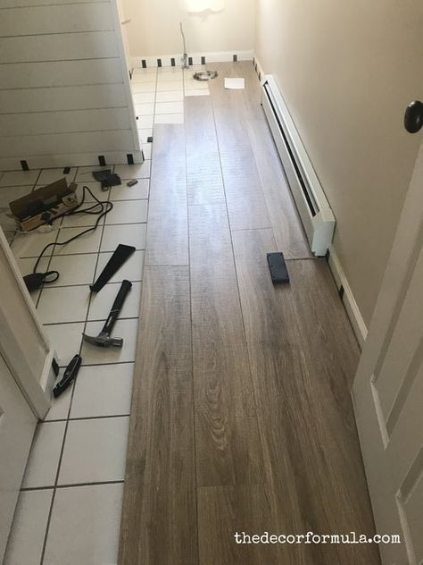 Ideas for Covering Up Tile Floors Without Removing It Tile In Basement Floor, Wood Over Tile Flooring, Tile To Match Wood Floors, How To Replace Tile Floor, Bathroom Wood Look Tile, Tile Floor Remodel Diy, Faux Marble Floor Tile, Replacing Tile Floor, Removing Ceramic Tile Floor