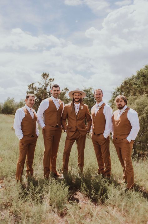 Cognac Groomsmen Suits, Woodsy Groom Attire, Brown Groom And Groomsmen Attire, Copper Vest Groomsmen, Earth Tone Groomsmen Attire, Bridal Bonfire Outfit, Boho Wedding Groomsmen Groom Attire, Bohemian Groomsmen Attire, Fall Color Groomsmen Attire