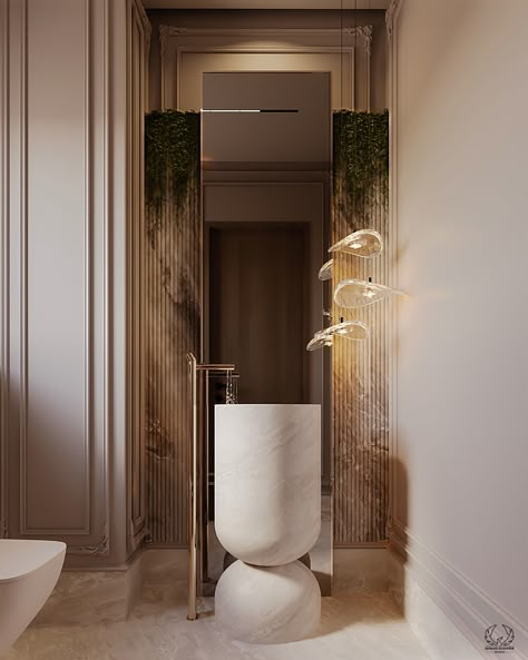 A Neo-Classic bathroom that provides timeless luxury. The beige wall panels form an elegant backdrop, which is enhanced with a dramatic stand-alone golden faucet and a stylish stone sink. This beautiful mix emanates subtle grace and timeless charm.

#NeoClassic #BathroomDesign #BeigeElegance #GoldenFaucet #StoneSink #neoclassicBathroom #luxuryBathroom Modern Classic Bathroom Design, Nurai Island, Luxury Guest Bathroom, Modern Classic Bathroom, Luxury Bathrooms Elegant, Classical Bathroom, Bedroom Design Luxury, Classic Bedroom Design, Elegant Bathroom Design