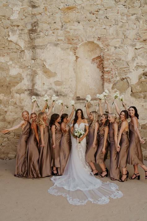 Bridal party photos at the San Juan Capistrano Mission September Wedding Champagne, Bridesmaid Dress Browns, Neutral Color Wedding Party, Spring Bridal Party Attire, Sage And Tan Bridal Party, Neutral Groomsmen Attire Color Palettes, Country Wedding Maid Of Honor Dresses, Wedding Reception Neutral Colors, Gold Brown Bridesmaid Dresses