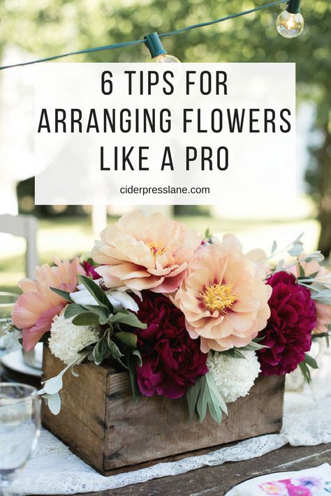 6 Tips For Arranging Flowers like a Pro even if you don't feel like it. You don't have to be a florist or a flower farmer to have beautiful centerpieces. But you will be a good host with them! Your tablescape will be the talk of the night! #tablescapes #dinnerparty #hostingtips #flowerarranging Flower Arrangements Inspiration, Containers For Flower Arrangements, Easy Fall Floral Arrangements, Bouquet Without Flowers, Modern Flower Arrangements Centerpieces, Floral Mechanics, Floral Workshop, Fake Flower Arrangements, Baby Pumpkin