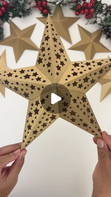 Judy on Instagram: "I love making these easy 3D paper stars to decorate my home for the holidays! You can easily add a string of fairy lights inside to turn them into a paper lantern as well.

Free files available in my highlights! 

Follow for more Christmas ideas this season!

#paperart #cricut #cricutmade #cricutcrafts #cricutchristmas #cricutproject #cricutcreations #teamcricut #makeitwithmichaels #makersgonnamake #handmadewithlove #handmadechristmas #christmasdecor #christmastree #christmasdiy #christmasproject #christmasdecorations #christmasspirit #christmascrafts #christmasstar #imadethis #paperartist #igdaily #diychristmas #christmasornaments #foryou #giftwrap #christmasideas #holidaygifts" 3d Paper Star, Paper Star Lanterns, Star Lanterns, 3d Star, Paper Lantern, Christmas Fairy, Paper Stars, Paper Artist, Cricut Creations