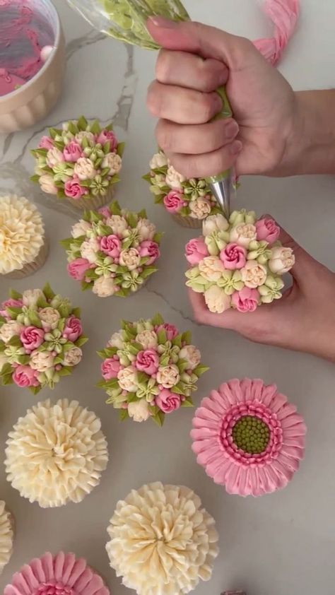 Spring is here and flower cupcakes are always a favorite choice! | spring, cupcake | Spring is here and flower cupcakes are always a favorite choice! | By MetDaan Cakes - Facebook | Spring is in the air and we've got the ultimate cupcake decorating idea to match. The floral buttercream piping gummies cupcakes is almost too beautiful to eat. This is like edible art. You'll have a blast trying out this new idea. Pretty Cupcakes Ideas Beautiful, Spring Cupcakes Easy, Garden Party Cupcake Ideas, Cute Girly Cupcakes, Flowers Cupcakes Ideas, Flower Garden Cupcakes, Floral Cupcake Designs, Flower Shaped Cupcakes, Spring Birthday Cupcakes