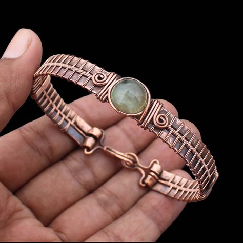 Prehnite Cuff Bracelet Copper Wire Wrapped Bangle Bracelet Handmade Bangle Cuff Gemstone Bracelet Prehnite Bracelet Wire Wrapped Jewelry Main Stone - Prehnite Bangle Length - 2.50 - 2.75" Inches (Adjustable) Bangle Width  -  0.50 Inches Metal                  -  Copper Copper Has Been Used For Jewelry Making For Thousands Of Years, Dating Back To Ancient Civilizations Such As The Egyptians, Romans, And Aztecs. Copper Was Valued For Its Beauty, Versatility, And Durability, And Was Often Used To M Link Bracelets Handmade, Bracelet Wire Wrapping, Copper Bracelets Handmade, Wire Jewelry Diy Tutorial, Antique Copper Jewelry, Handmade Copper Bracelet, Wire Cuff Bracelet, Wire Wrapped Bangles, Bijoux Fil Aluminium