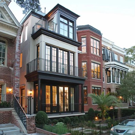 Renovated townhouse to embrace a modern aesthetic. It features a bay window with a balcony and sleek railings that enhance its contemporary appeal. The windows are framed in black with elegant muntins. The façade showcases a blend of modern materials and stylish finishes. Website: https://www.acarchitecturaldesign.ca/ #architecture #urban #city #homes #realestate #luxury #design #exterior #modern #contemporary #house #homesweethome #dreamhome #beautiful #homesofinstagram Luxury Townhouse Exterior, Gentrification Architecture, New York House Exterior, Modern Townhouse Facade, Loft Apartment Exterior, Townhouse Exterior Design, City House Exterior, Town House Exterior, Townhouse Aesthetic