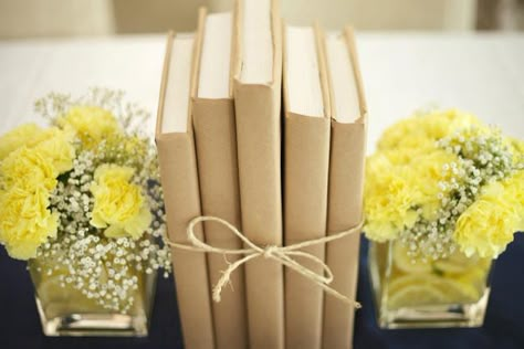 covered books centerpieces graduation | Yellow Carnation & Book Centerpieces Retirement Party Themes, Teacher Retirement Parties, Book Centerpieces, Book Themed Party, Yellow Carnations, Book Themed Wedding, Literary Wedding, Book Launch Party, Storybook Baby Shower