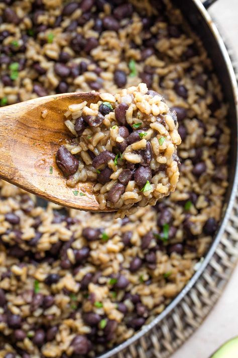 Try Gallo Pinto - the famous Costa Rican Rice and Beans recipe! This version was taught to us by a Costa Rican exchange student – her treasured, authentic family recipe. It’s super-easy, DELICIOUS and ready in less than 10 minutes! It’s often served as a Costa Rican breakfast, but it’s eaten any time of day – breakfast, lunch or dinner – as a side dish or a hearty vegetarian main course. And, it keeps great for days, so it’s a perfect make-ahead recipe for meal prep! | ... Spanish Rice And Beans Recipe Authentic, Healthy Hispanic Recipes, Costa Rican Rice, Beans And Rice Recipes, Authentic Costa Rican Recipes, Costa Rican Rice And Beans, Costa Rica Rice And Beans Recipe, Spanish Rice And Beans Puerto Rico, Gallo Pinto Costa Rica